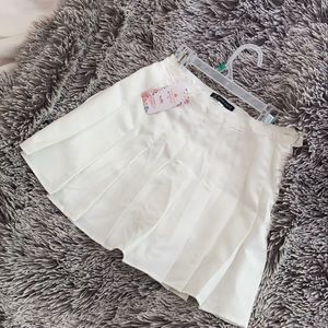 white tennis skirt